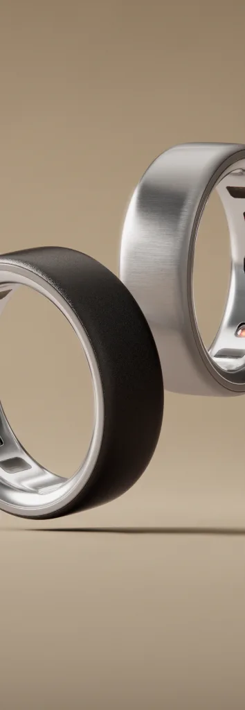 3 Oura rings on a beige background